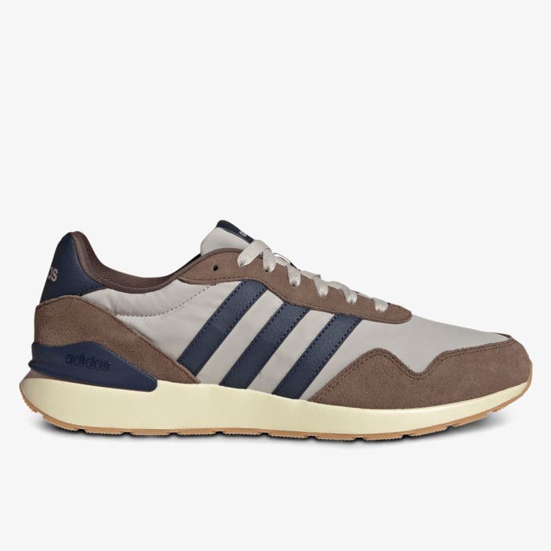 Adidas Retro Running Sneaker in Beige mit Navy-Streifen und Braun-Akzenten, Vintage-Laufschuh